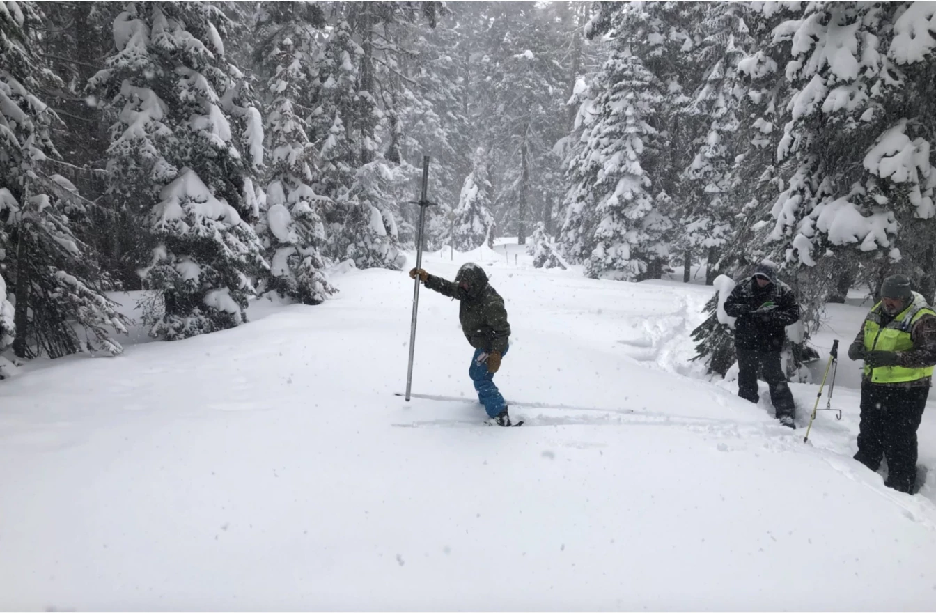 Austin Patch, OWRD Assistant Watermaster, takes a snow-core sample at the Ski Bowl Road snow course in Southern Oregon. Snowpack at the site is 88% of median as of March 1st. (February 27th, 2023)